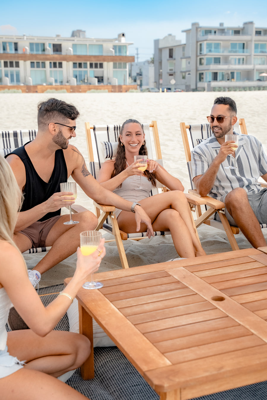 The Beach Oasis team setting up a beach cabana